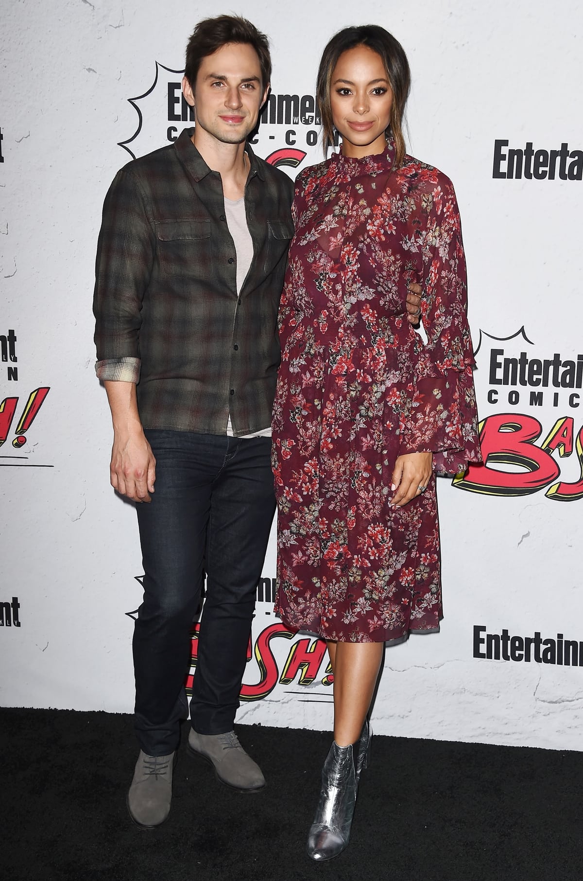 Joined by her husband Andrew J. West, Amber Stevens West wore a floral print IRO long-sleeve dress at Entertainment Weekly's annual Comic-Con party