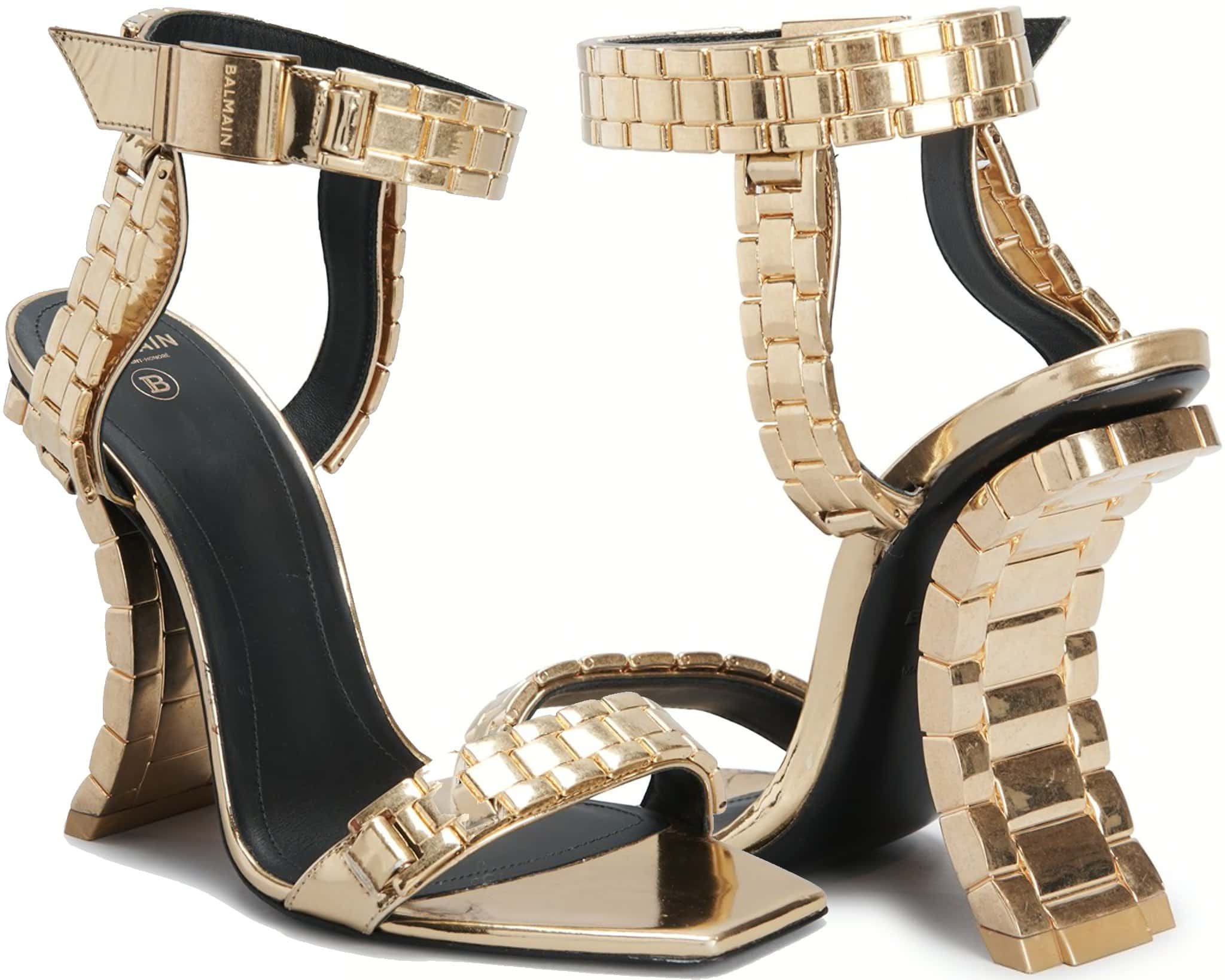 These sandals feature metallic leather and aluminum chain set atop a 4-inch architectural chain heel