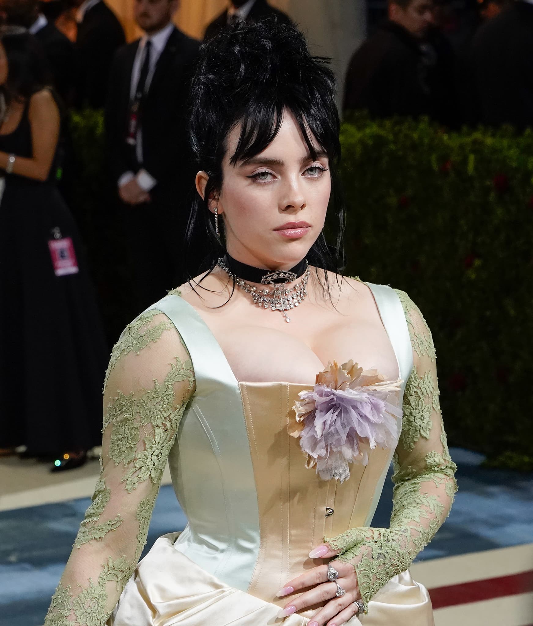 Billie Eilish completes her gothic gilded age look with a spiky fauxhawk and winged eyeliner