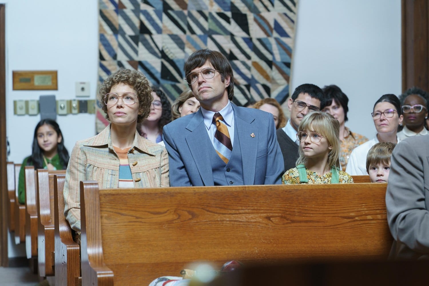 Jessica Biel as the real-life Candy Montgomery, Timothy Simons as Pat Montgomery, Aven Lotz as Becky Montgomery, and Dash McCloud as Jason Montgomery in the American crime drama streaming television miniseries Candy