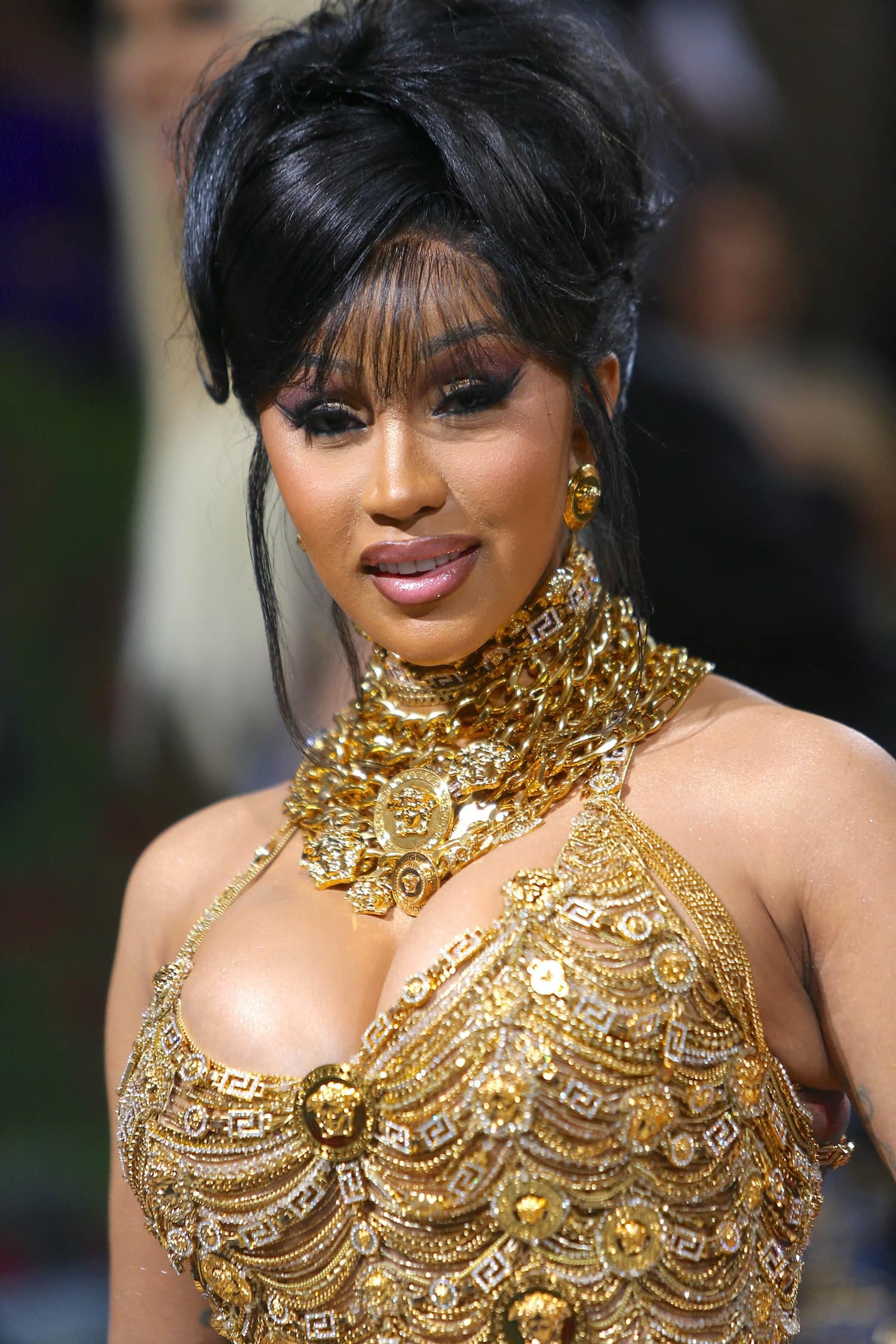 Cardi B wore a Versace dress embroidered with gold chains that took 20 craftsmen 1,300 hours to complete