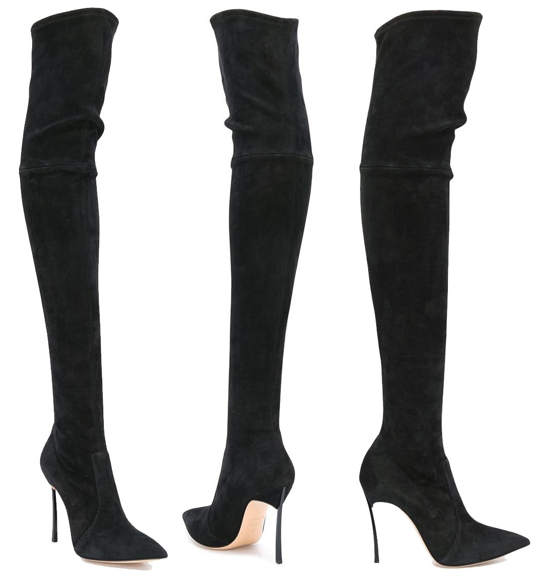 A sultry pair of slip-on over-the-knee boots made of suede, finished with the brand's signature Blade stiletto heels