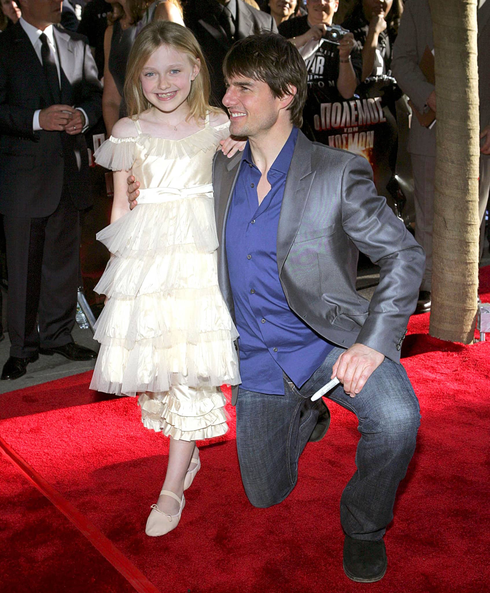 Dakota Fanning with Tom Cruise at the US premiere of War of the Worlds on June 23, 2005