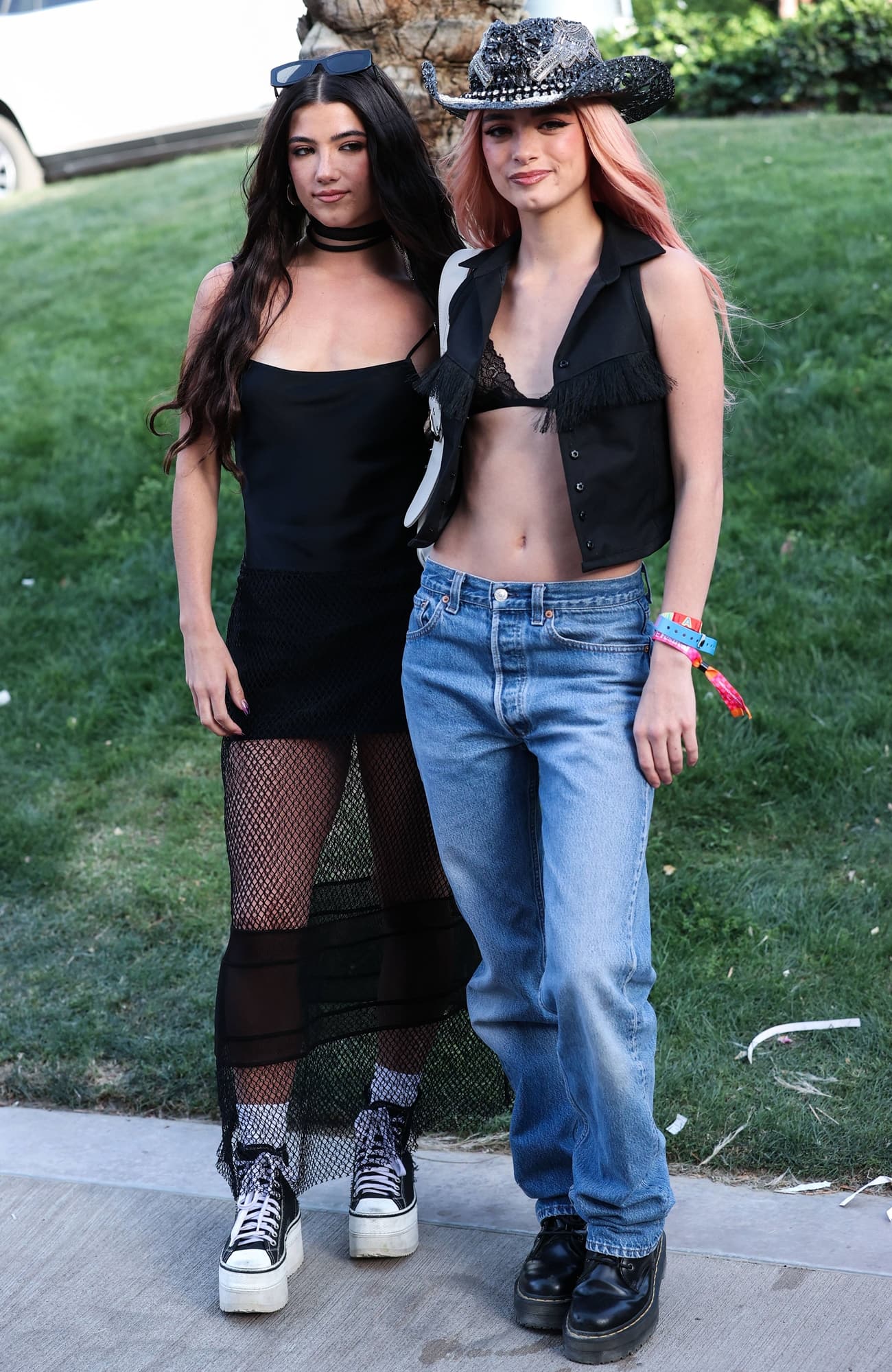 Dixie D'Amelio with her sister Charli D'Amelio at the Revolve Festival outside Coachella