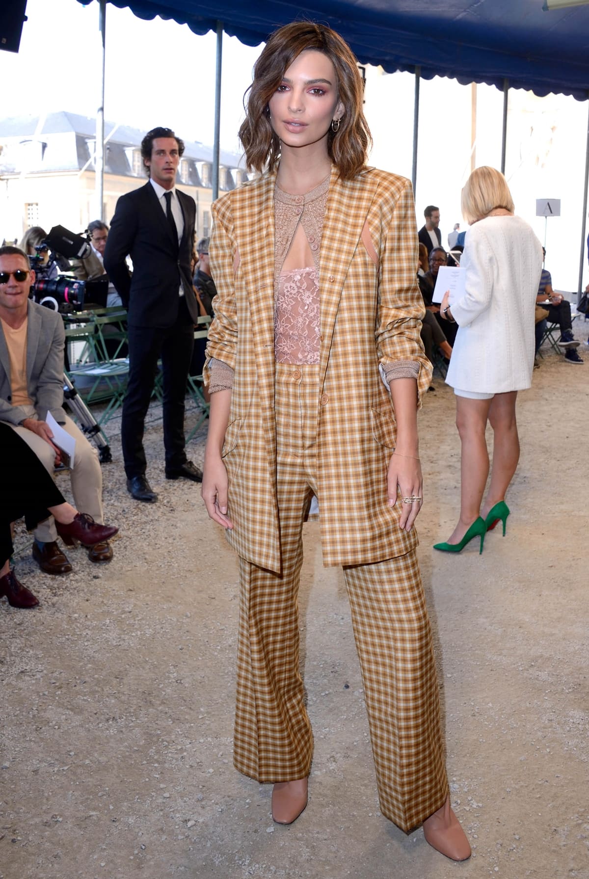 Emily Ratajkowski in a plaid suit at the Nina Ricci show as part of the Paris Fashion Week Womenswear Spring/Summer 2018