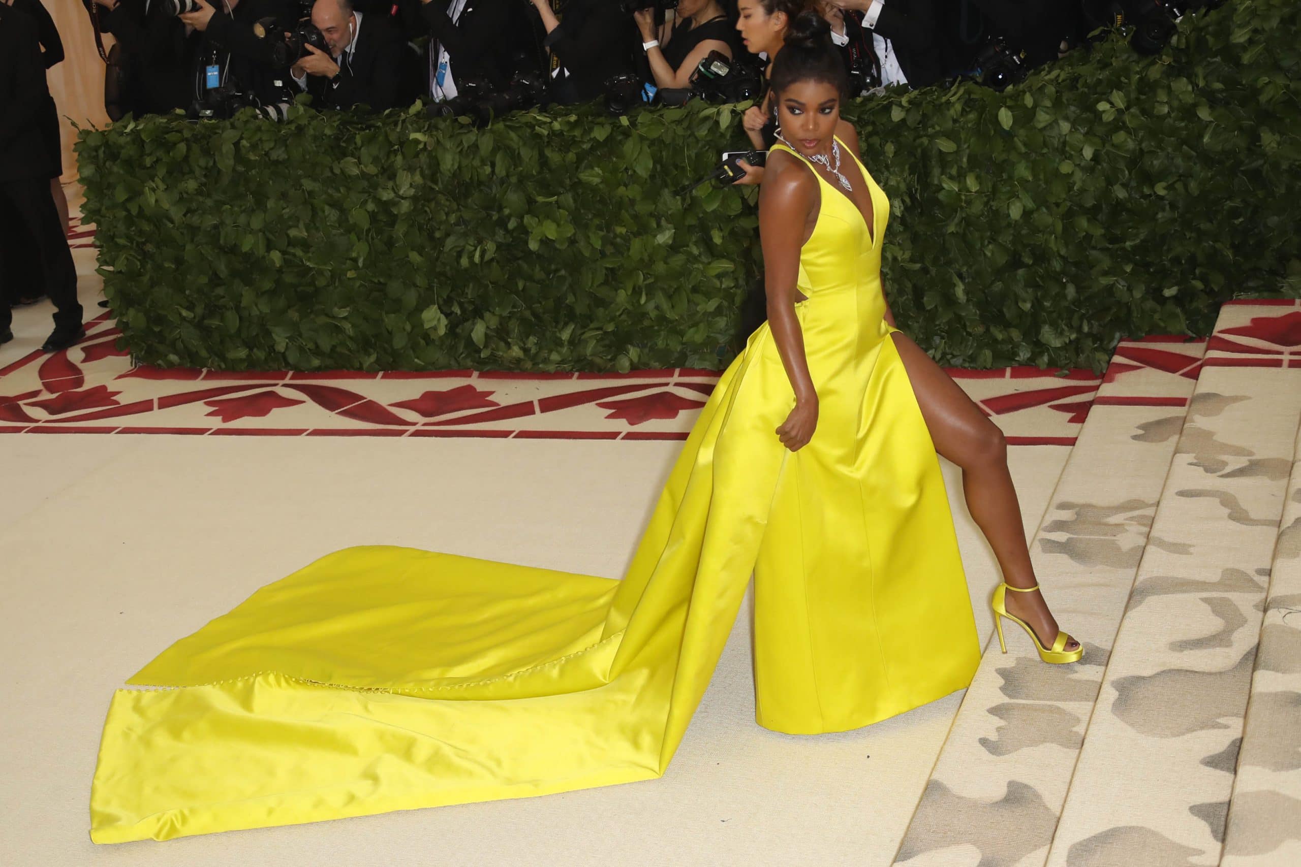 Gabrielle Union looks stunning on the red carpet in a Prabal Gurung dress, Tasaki jewelry, and Stuart Weitzman shoes at the 2018 Met Gala