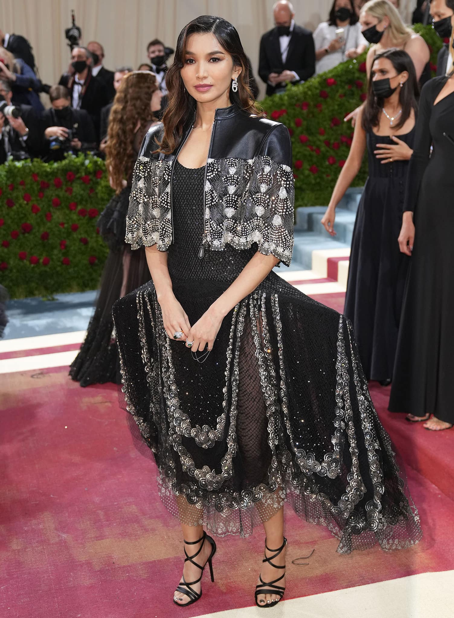 Gemma Chan pairs her crystal-embroidered gown with gladiator strappy heels