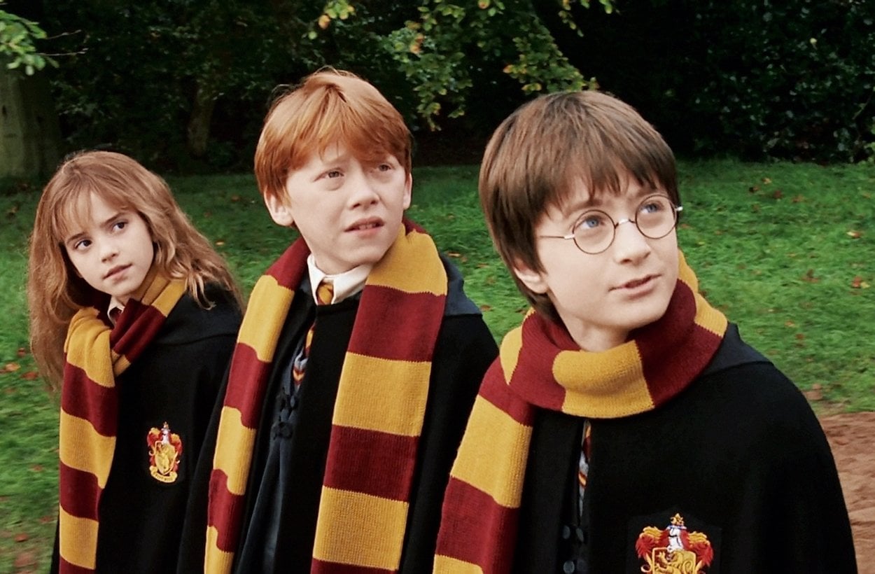 Emma Watson as Hermione Granger, Rupert Grint as Ron Weasley, and Daniel Radcliffe as Harry Potter in the 2001 fantasy film Harry Potter and the Philosopher's Stone (also known as Harry Potter and the Sorcerer's Stone)