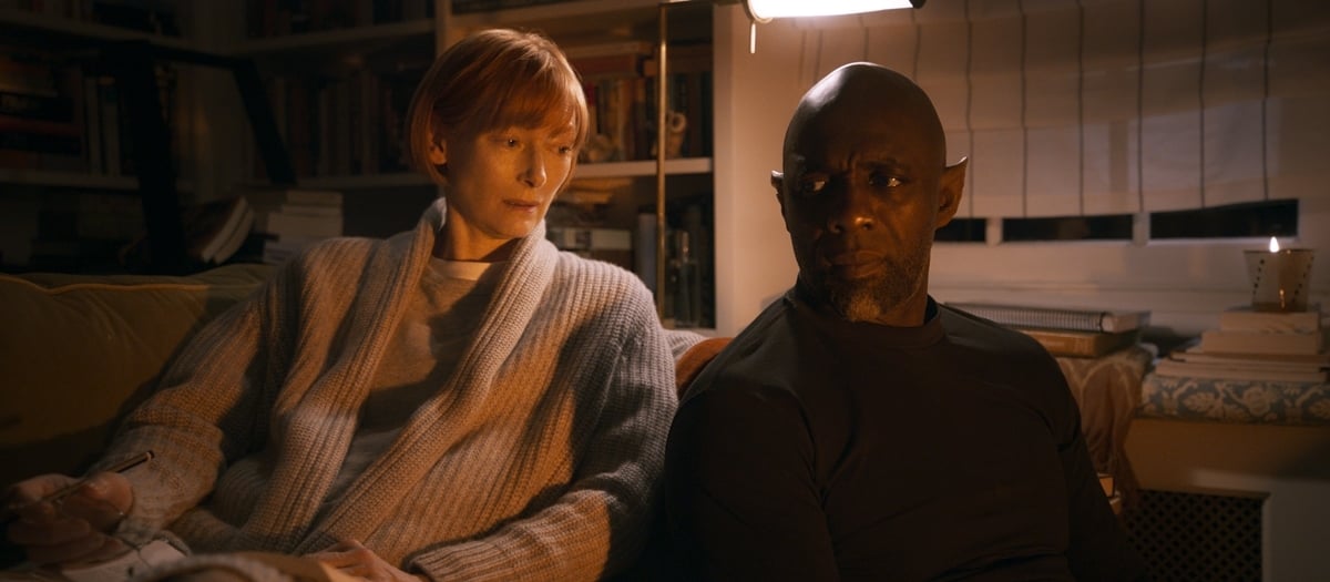 Idris Elba as genie Djinn grants Tilda Swinton as British professor Alithea Binnie three wishes in exchange for his freedom