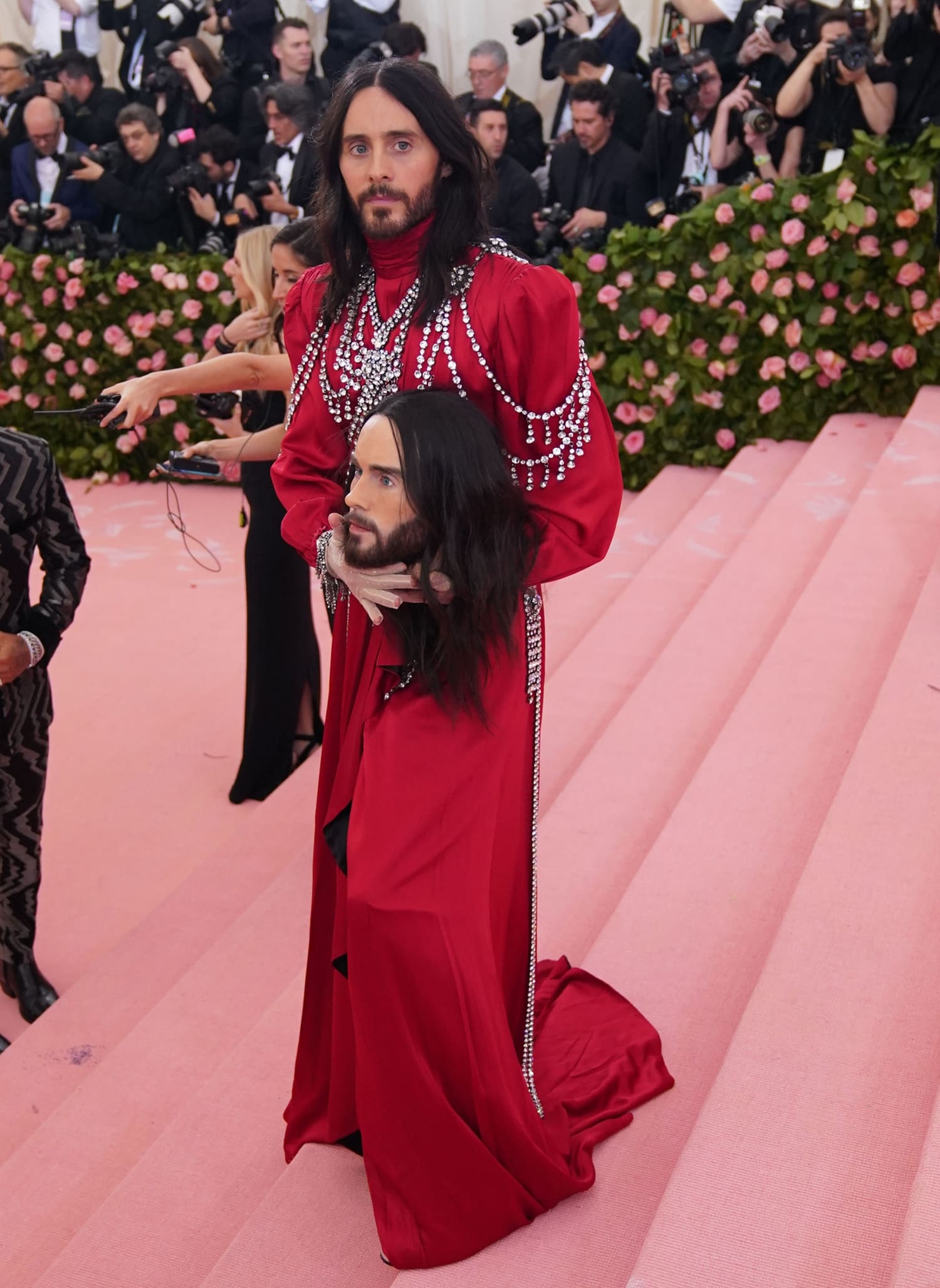 Jared Leto in a Gucci outfit with a wax replica of his head at the 2019 Met Gala