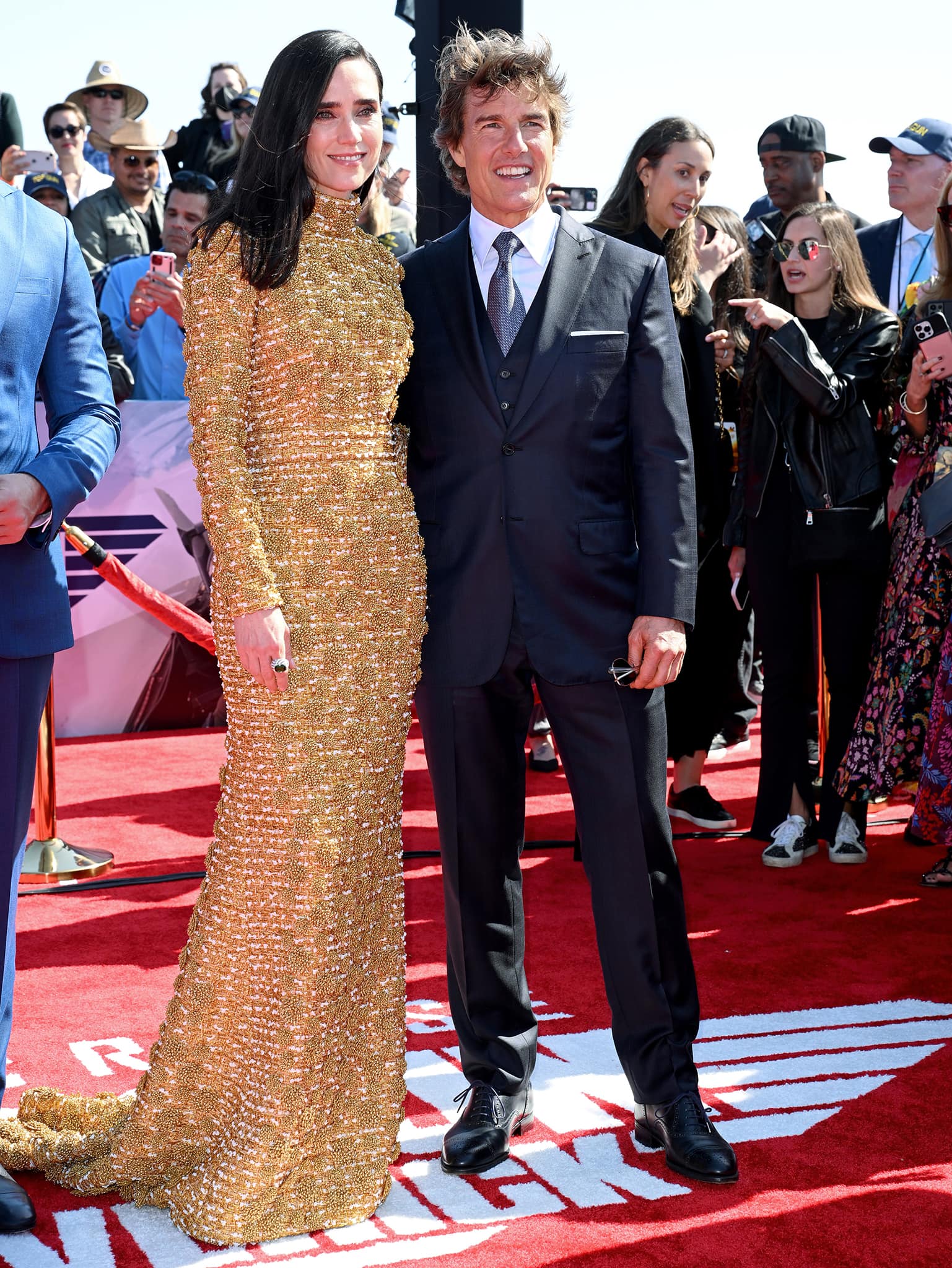 Jennifer Connelly and Tom Cruise arrive at the aircraft carrier USS Midway for Top Gun: Maverick world premiere