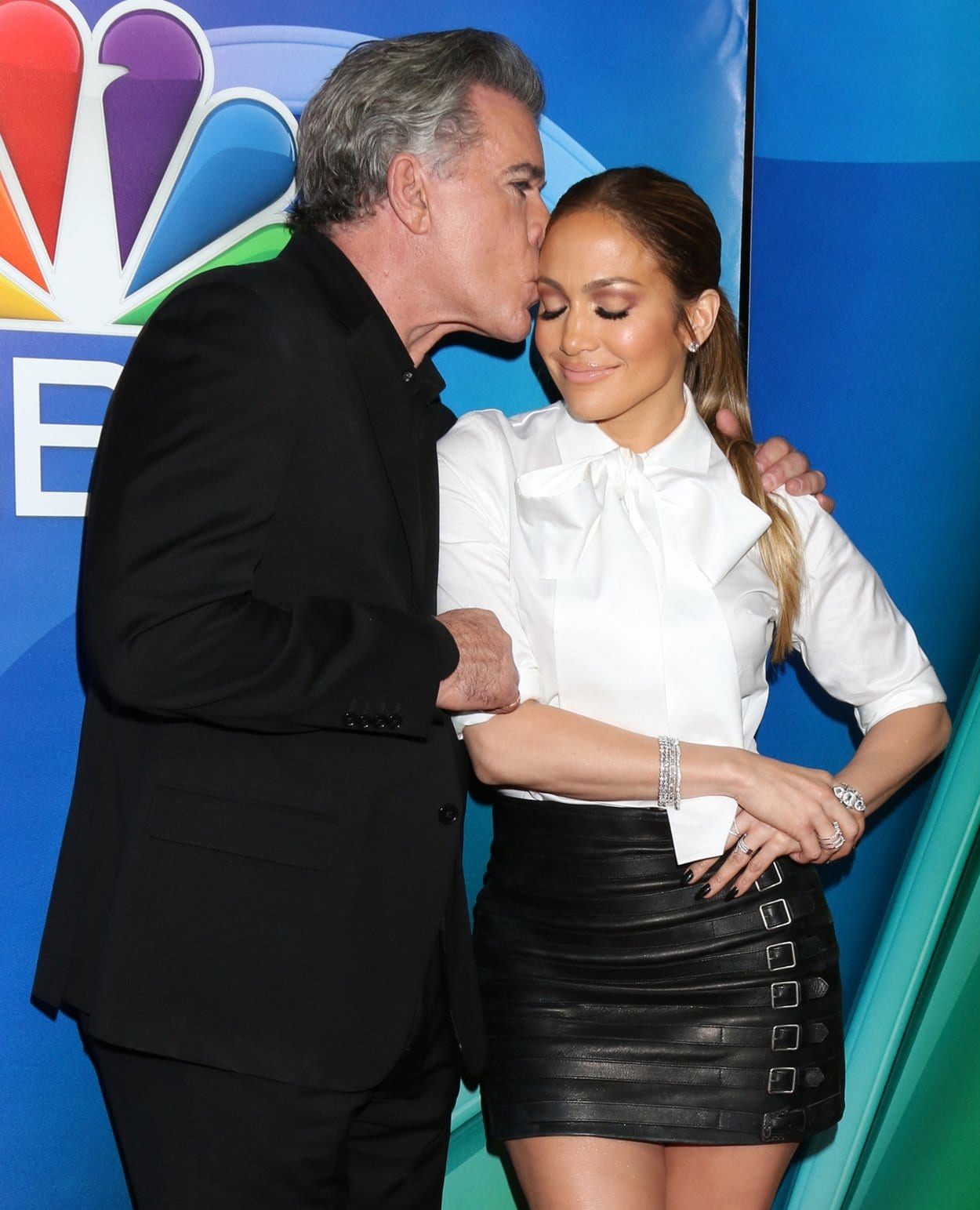 Jennifer Lopez gets a kiss on the head from her 'Shades of Blue' co-star Ray Liotta