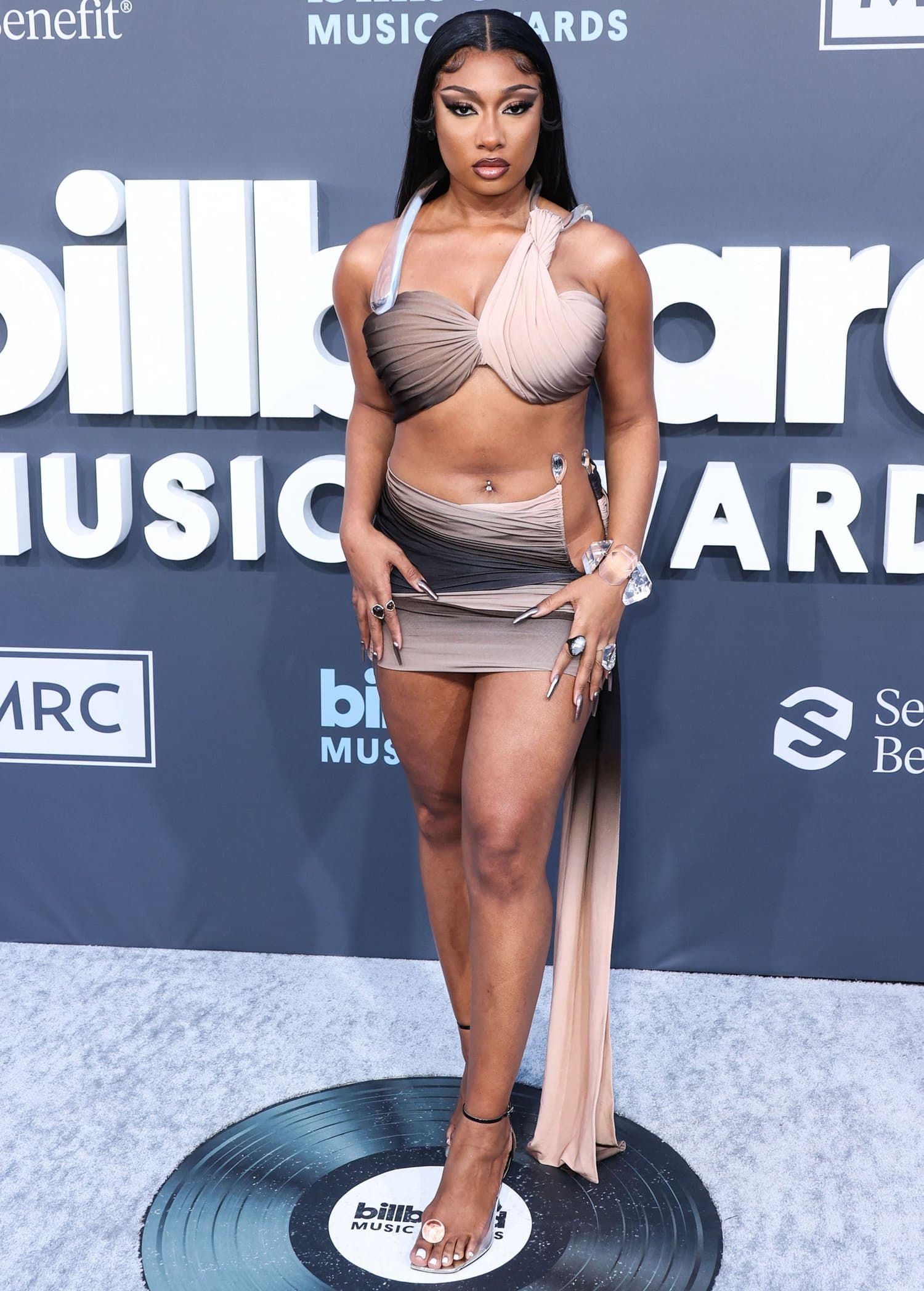 Megan Thee Stallion flaunts her legs in a cutout bandage dress at the 2022 Billboard Music Awards