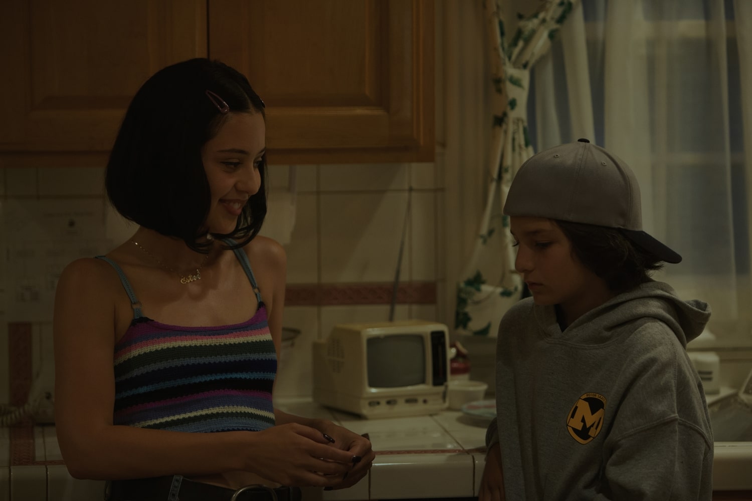 Alexa Demie as Estee and Sunny Suljic as Stevie "Sunburn" in the 2018 American coming-of-age comedy-drama film Mid90s
