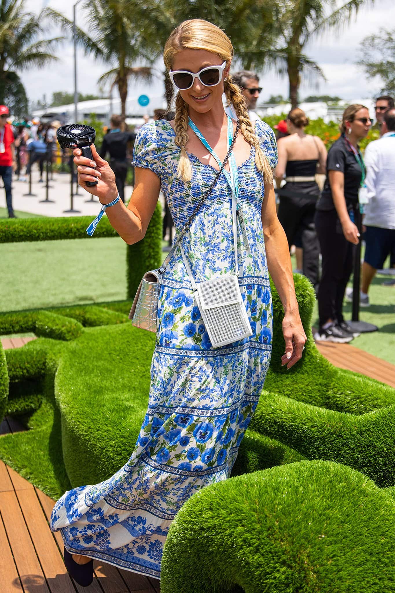 Paris Hilton's Alice + Olivia Rosalyn floral maxi dress is made of floral printed fabric with a shirred bodice and short puff-sleeves