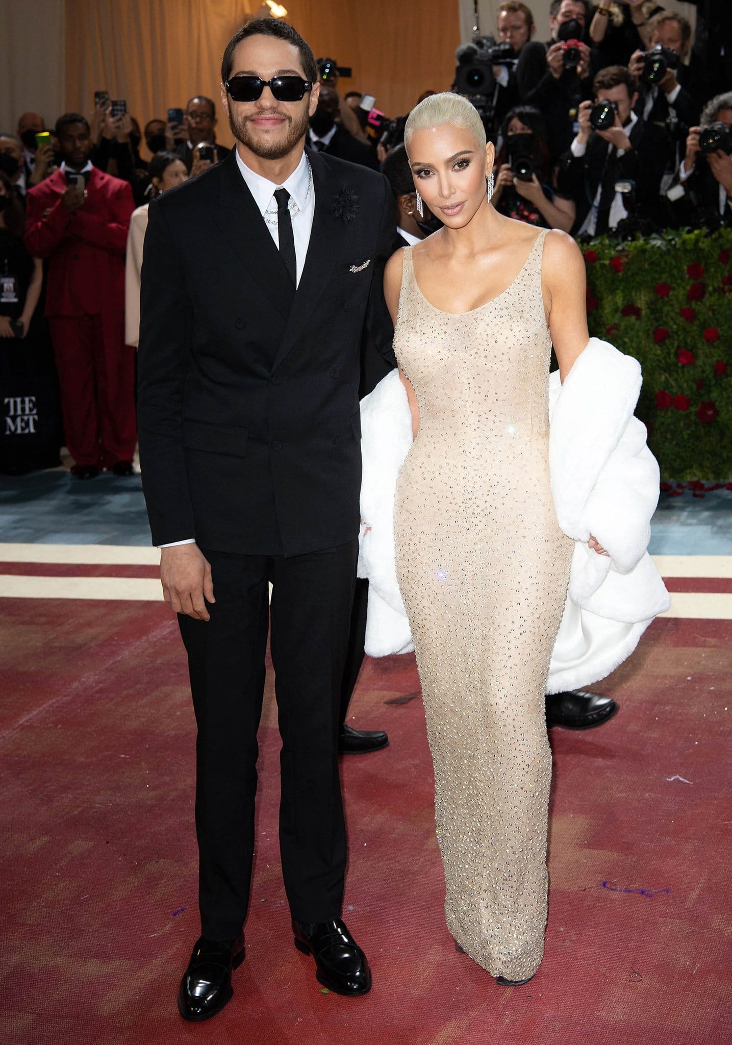 Kim Kardashian wearing the controversial Marilyn Monroe dress at the 2022 Met Gala with then-boyfriend Pete Davidson