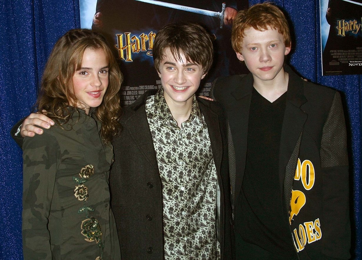 Emma Watson, Daniel Radcliffe, and Rupert Grint at the premiere of 'Harry Potter and the Chamber of Secrets'