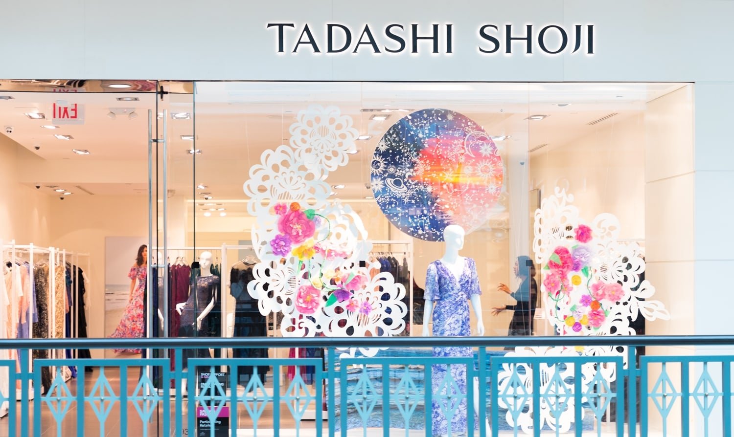 You can explore the world of Tadashi Shoji both in stores and online