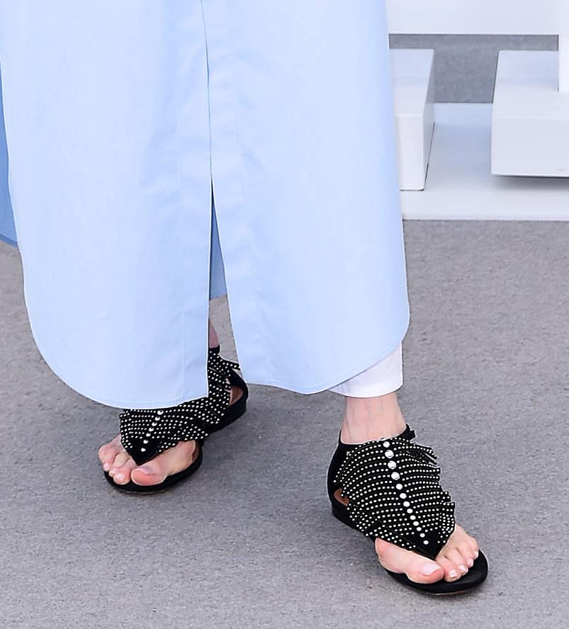 Tilda Swinton completes her chic laidback look with Alaia studded fringe flat sandals