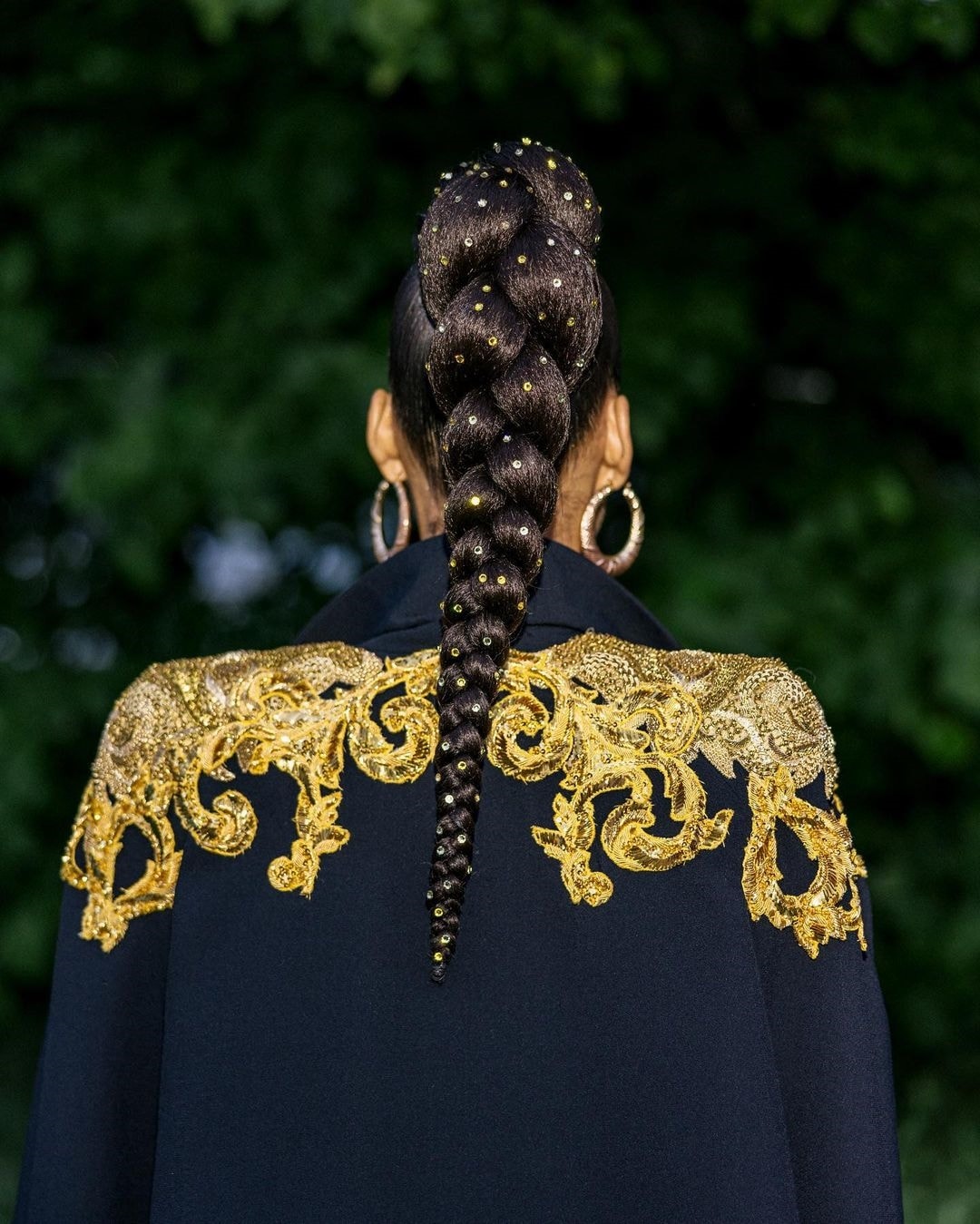 Alicia Keys shared a detailed look at the gold embroidery on her cape and the gold speckles on her braid