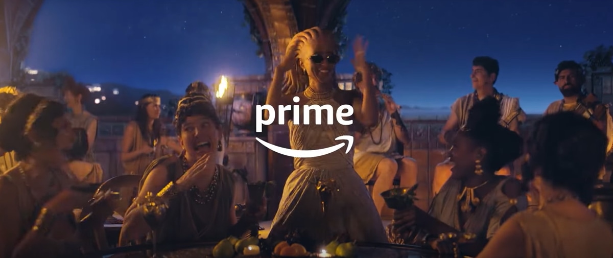 Everyone in Amazon's Prime commercial celebrates after Medusa kills a man who winked at her