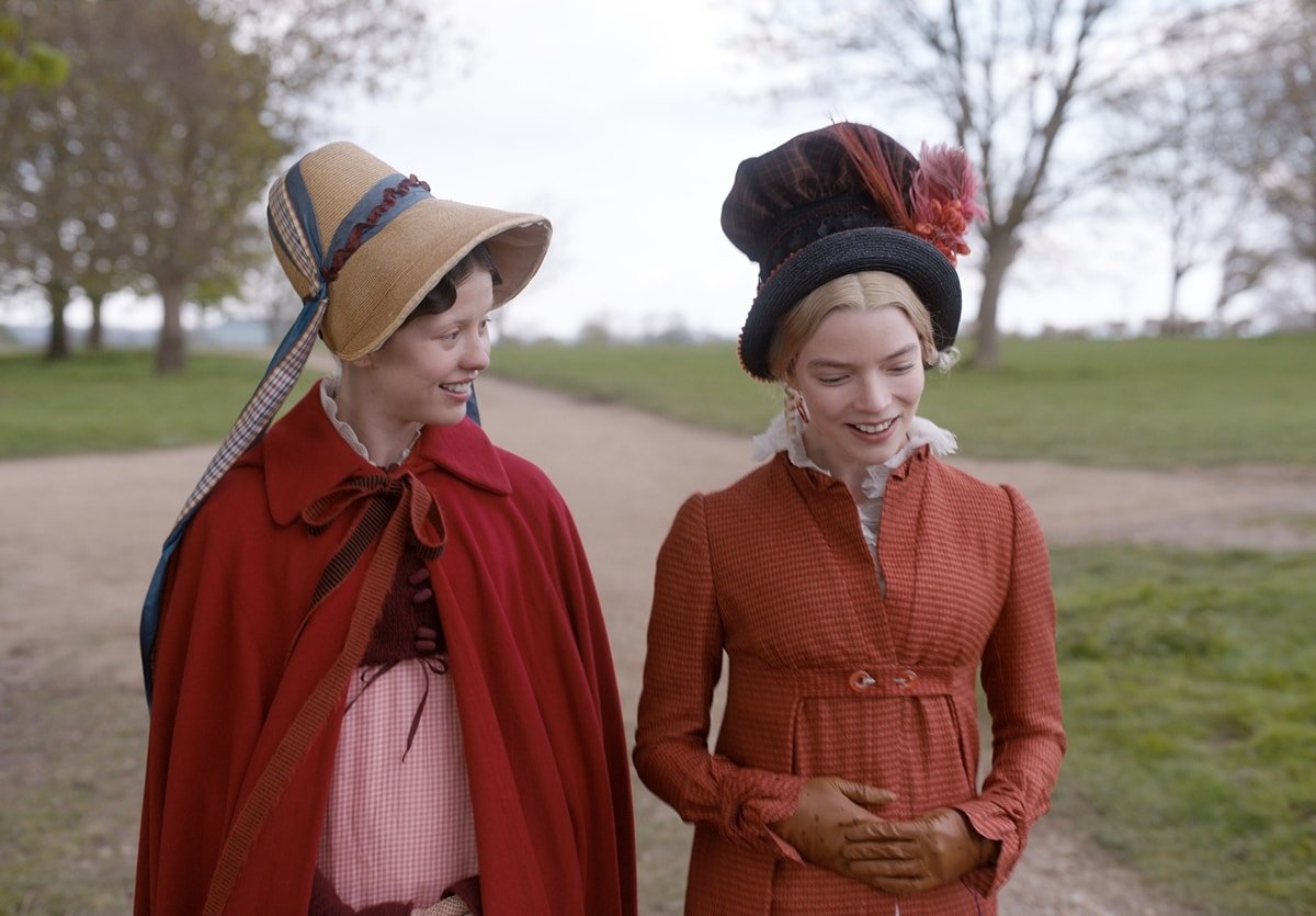 Anya Taylor-Joy as Emma Woodhouse and Mia Goth as Harriet Smith in the 2020 period romantic comedy film EMMA
