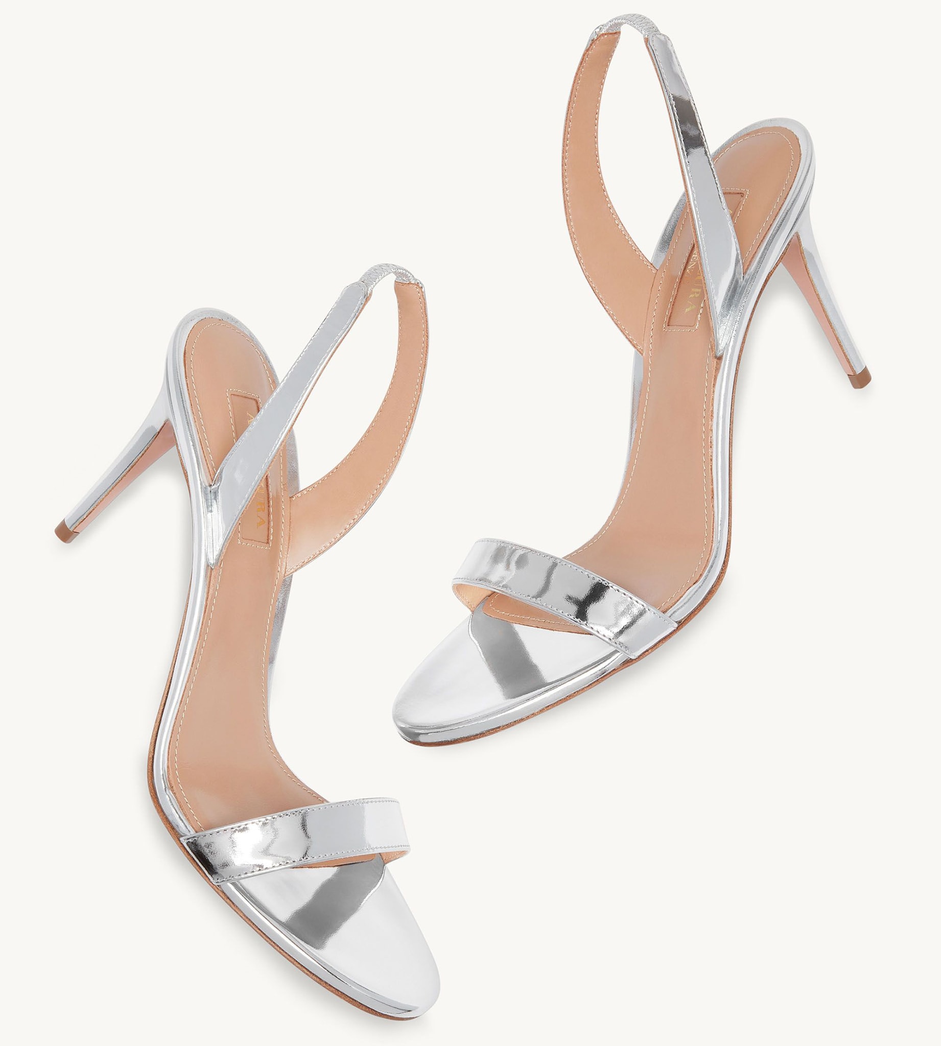 The So Nude heels feature a minimalist silhouette with front straps and slingback straps