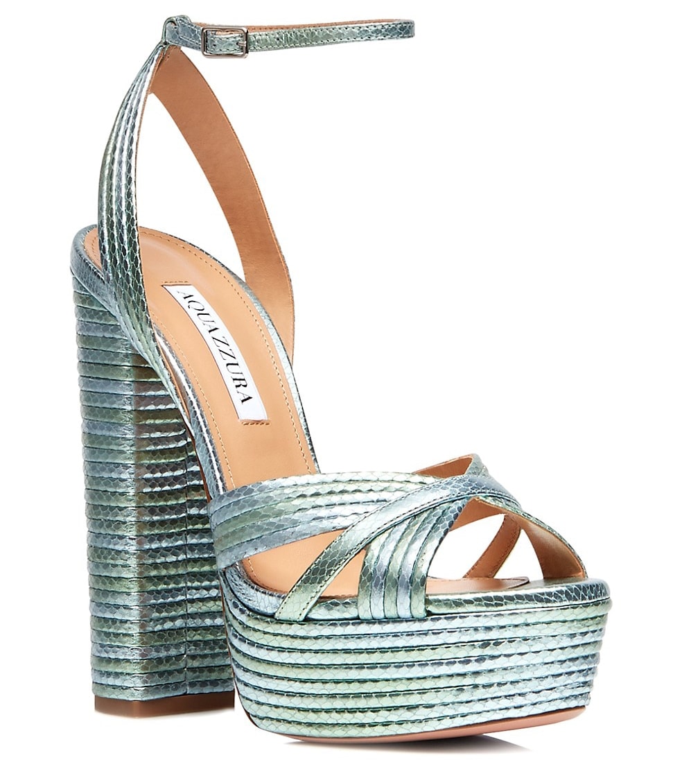 The Sundance sandals are made of metallic snake degrade goat leather and feature high platforms and block heels