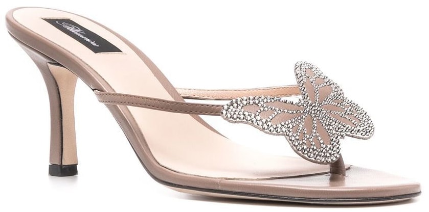 These simple mules feature a 3-inch heel and an embellished butterfly on the thong toe post