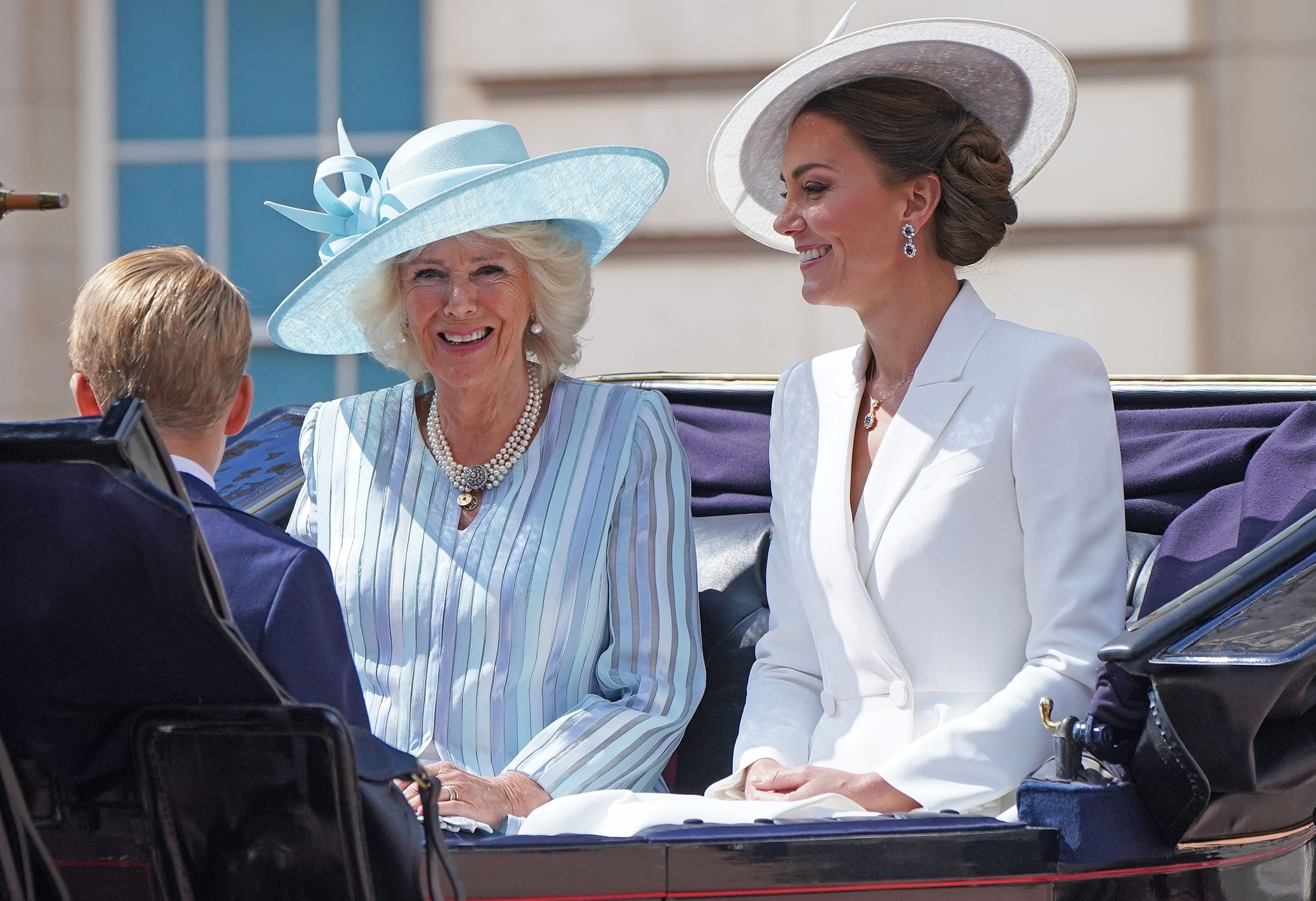 Catherine, Duchess of Cambridge, in Alexander McQueen Bespoke Coatdress and Philip Treacy Oc 915 hat with Camilla, Duchess of Cornwall, during day one of Platinum Jubilee Celebrations on June 2, 2022