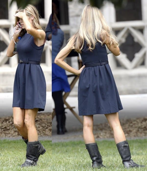 Denise Richards shows how to wear a blue sleeveless dress with black boots