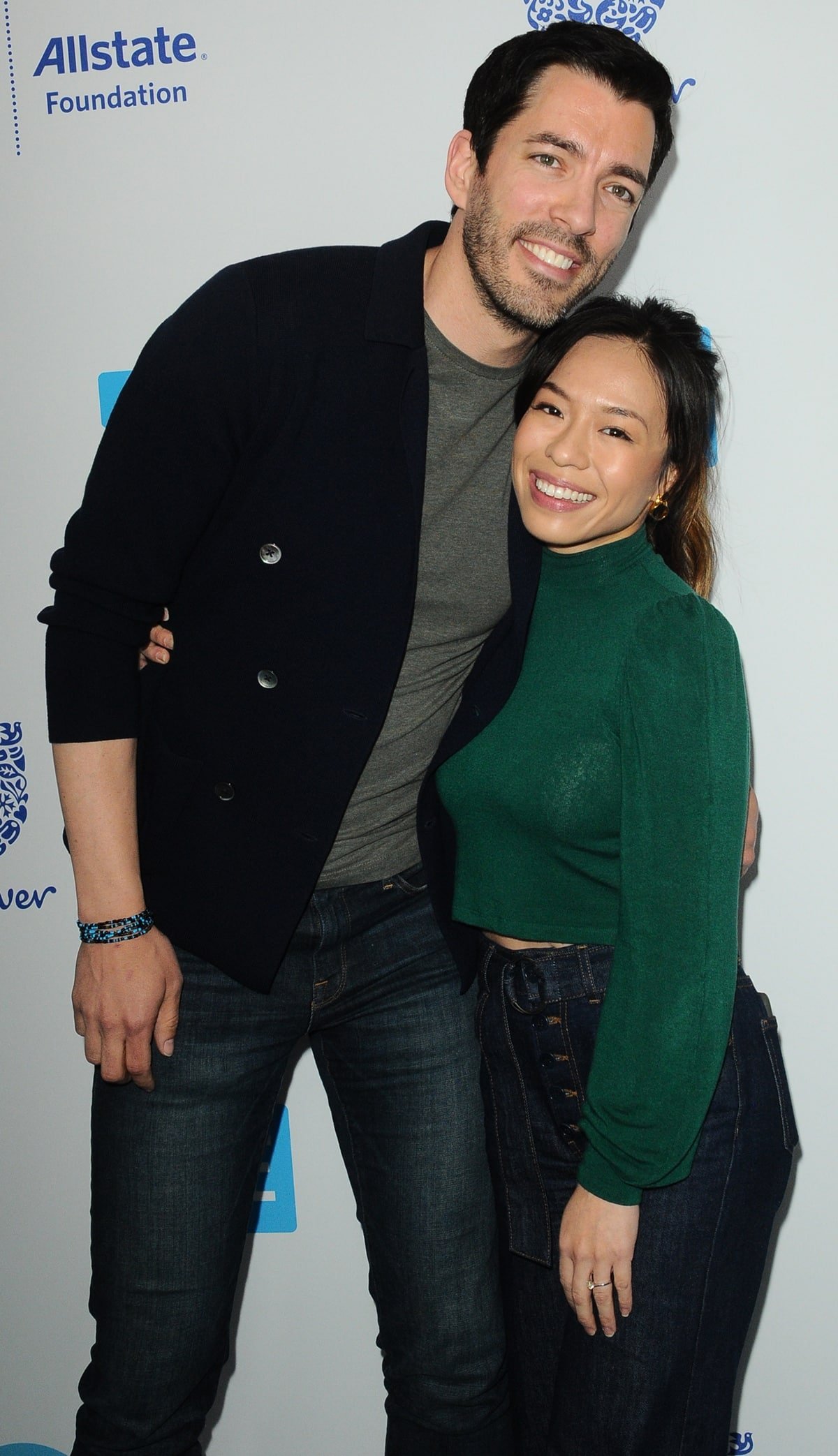 Drew Scott with his much shorter wife Linda Phan at WE Day California