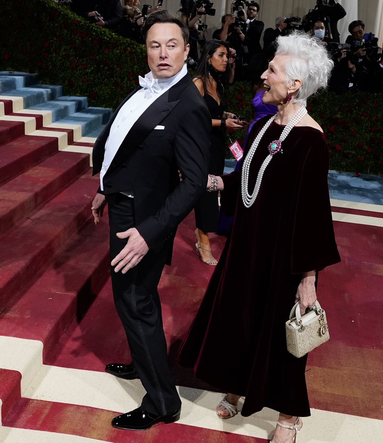 Elon Musk has fun with his mom, Maye Musk, at the 2022 Met Gala on May 2, 2022, t the Metropolitan Museum of Art