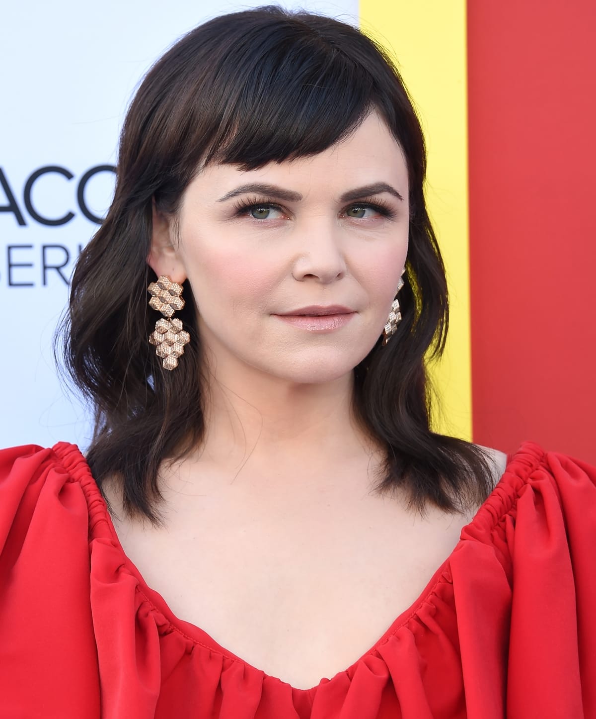 Ginnifer Goodwin in a red dress at the premiere of Why Women Kill