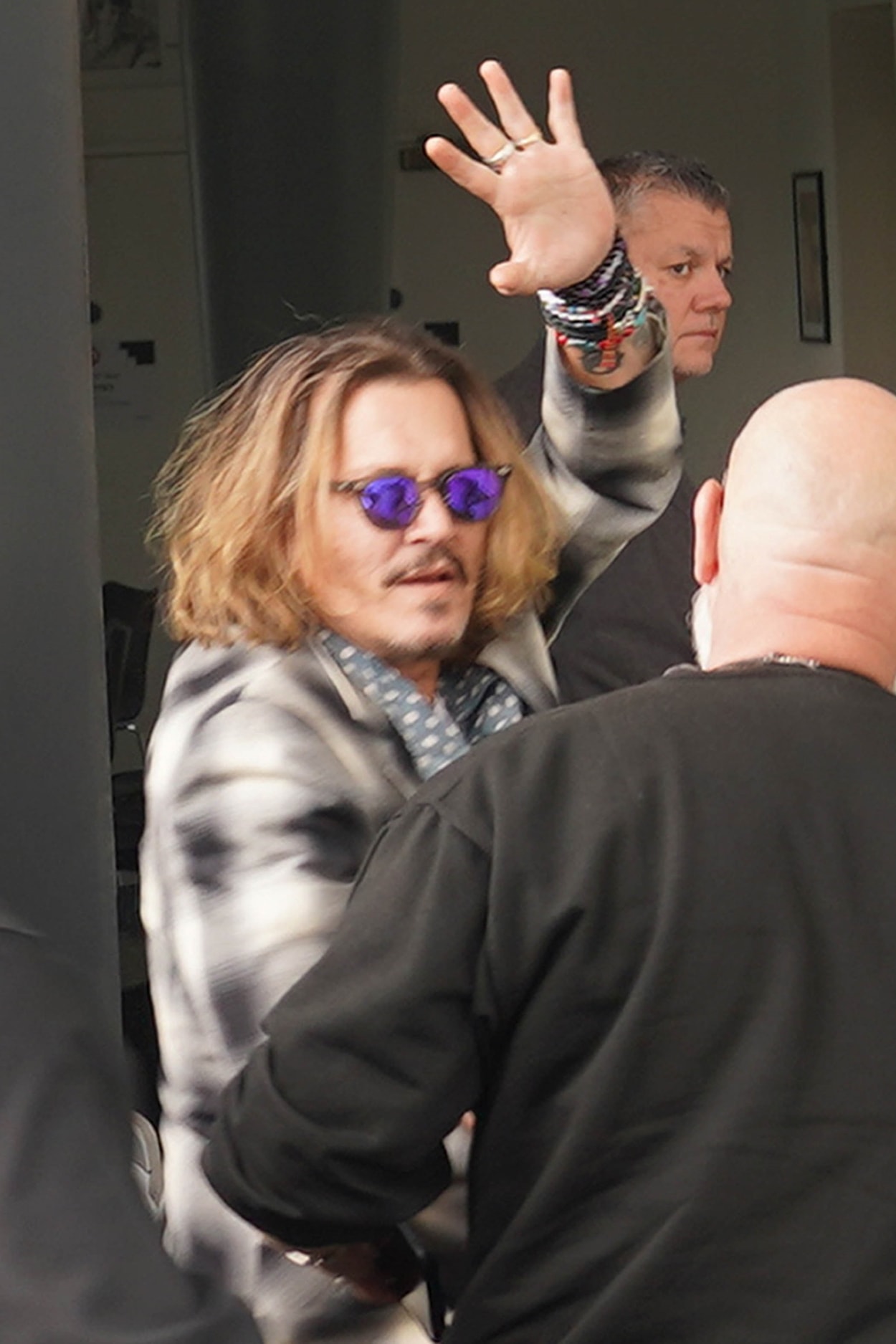 Johnny Depp waved to fans as he arrived at The Sage in Gateshead, England, on June 2, 2022, after the victory in his defamation trial against Amber Heard