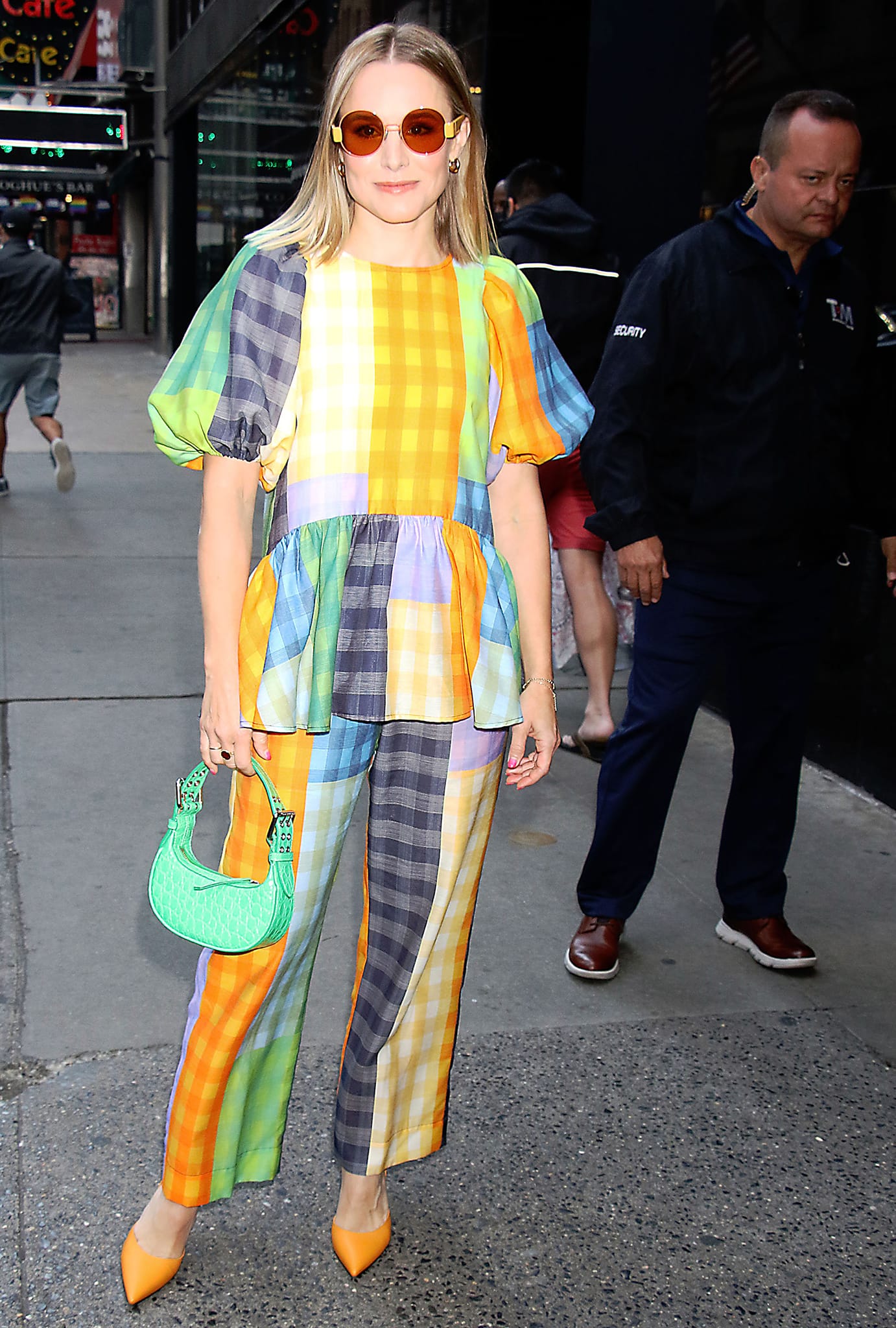 Kristen Bell looks radiant in Stine Goya multicolored gingham-patterned peplum top and trousers