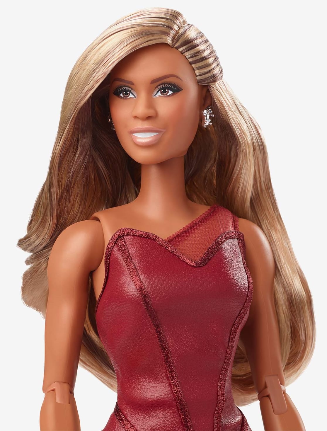 The Laverne Cox Barbie with her hair swept into glamorous Hollywood waves