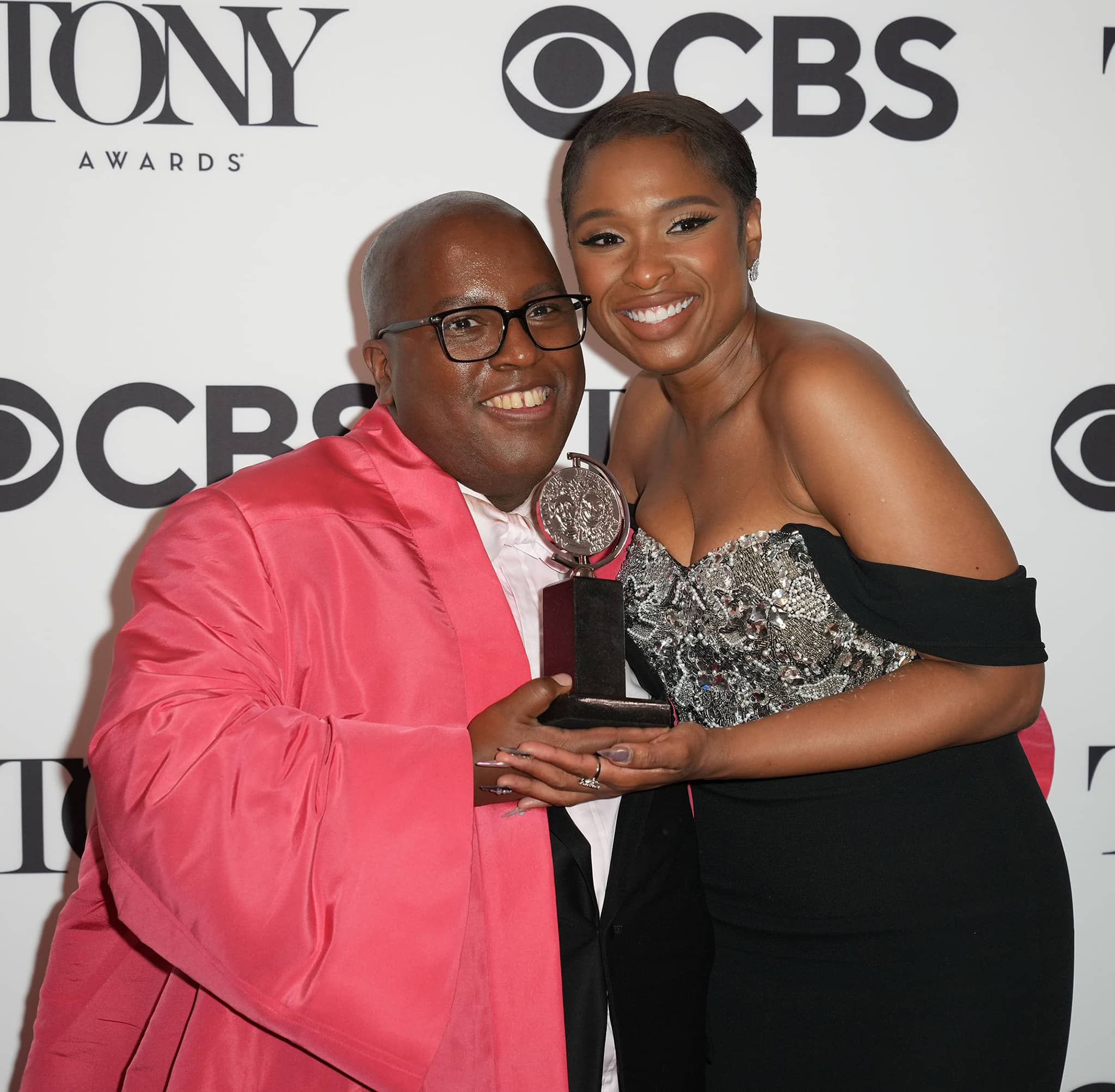 A Strange Loop playwright, composer and lyricist Michael R. Jackson and producer Jennifer Hudson pose with their Tony Award Best Musical trophy on June 12, 2022