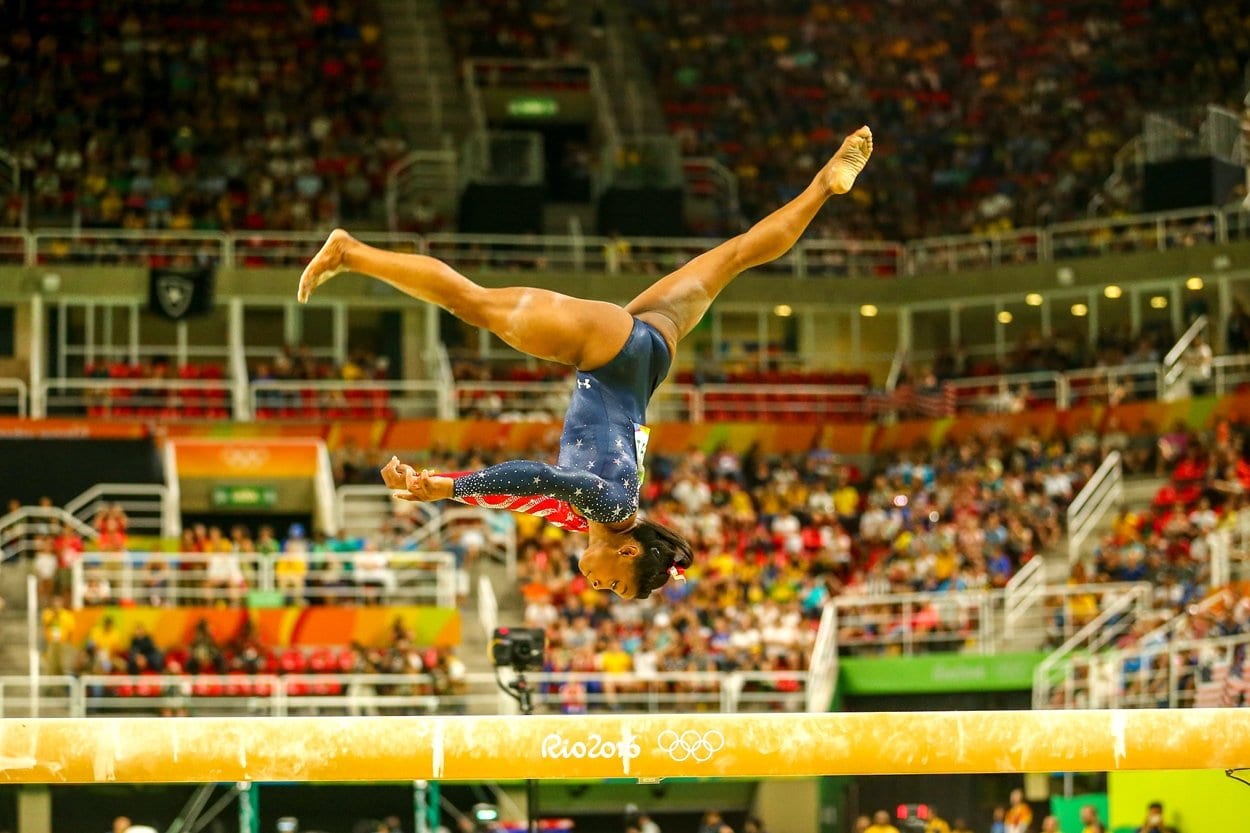Olympic champion Simone Biles of the United States competing on the balance beam at women's all-around gymnastics qualifying at the Rio 2016 Olympic Games