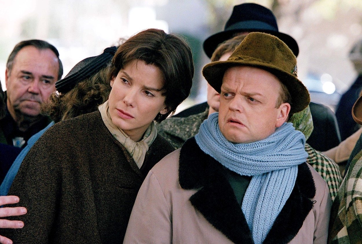 Sandra Bullock as Harper Lee and Toby Jones as Truman Capote in the 2006 American drama film Infamous