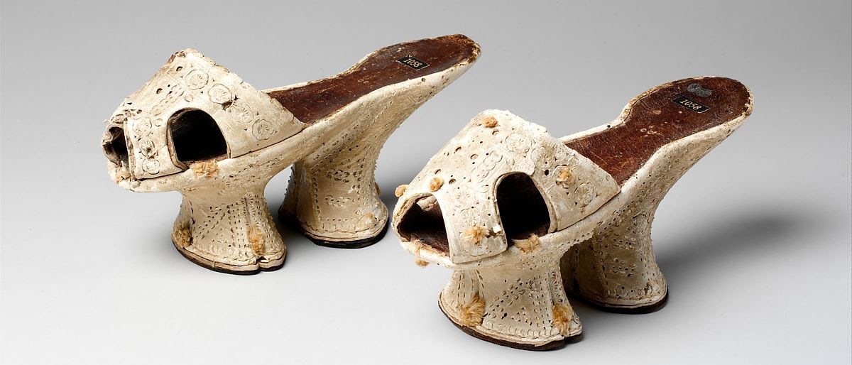 These are chopines, high platform shoes worn by European nobles in the 16th century to display wealth and elevate height