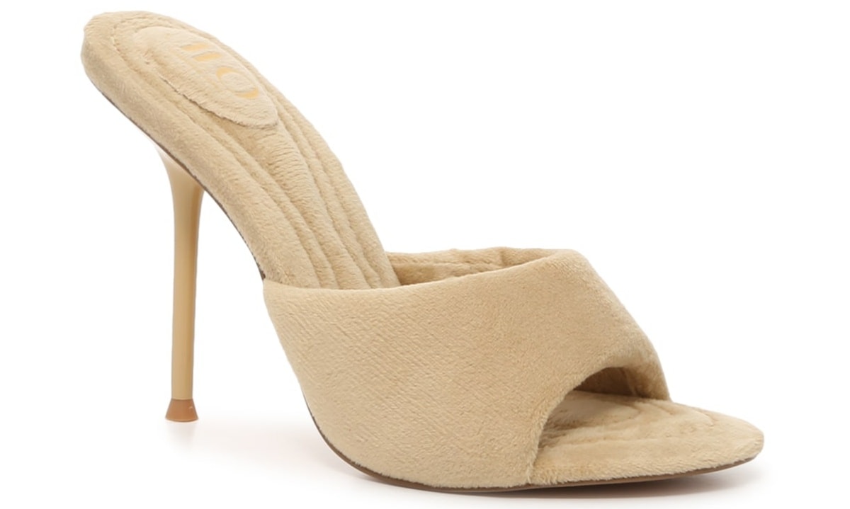 As seen on Jennifer, these sandals have plush fabric uppers and four-inch stiletto heels