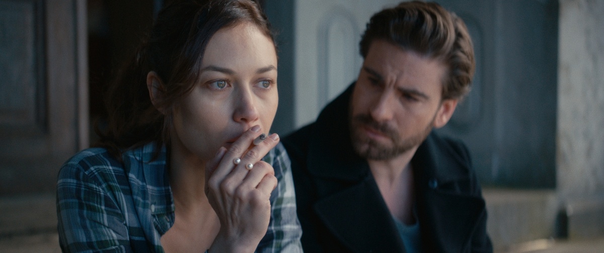 Olga Kurylenko as Kate and Kevin Janssens as Matt in the 2019 thriller film The Room