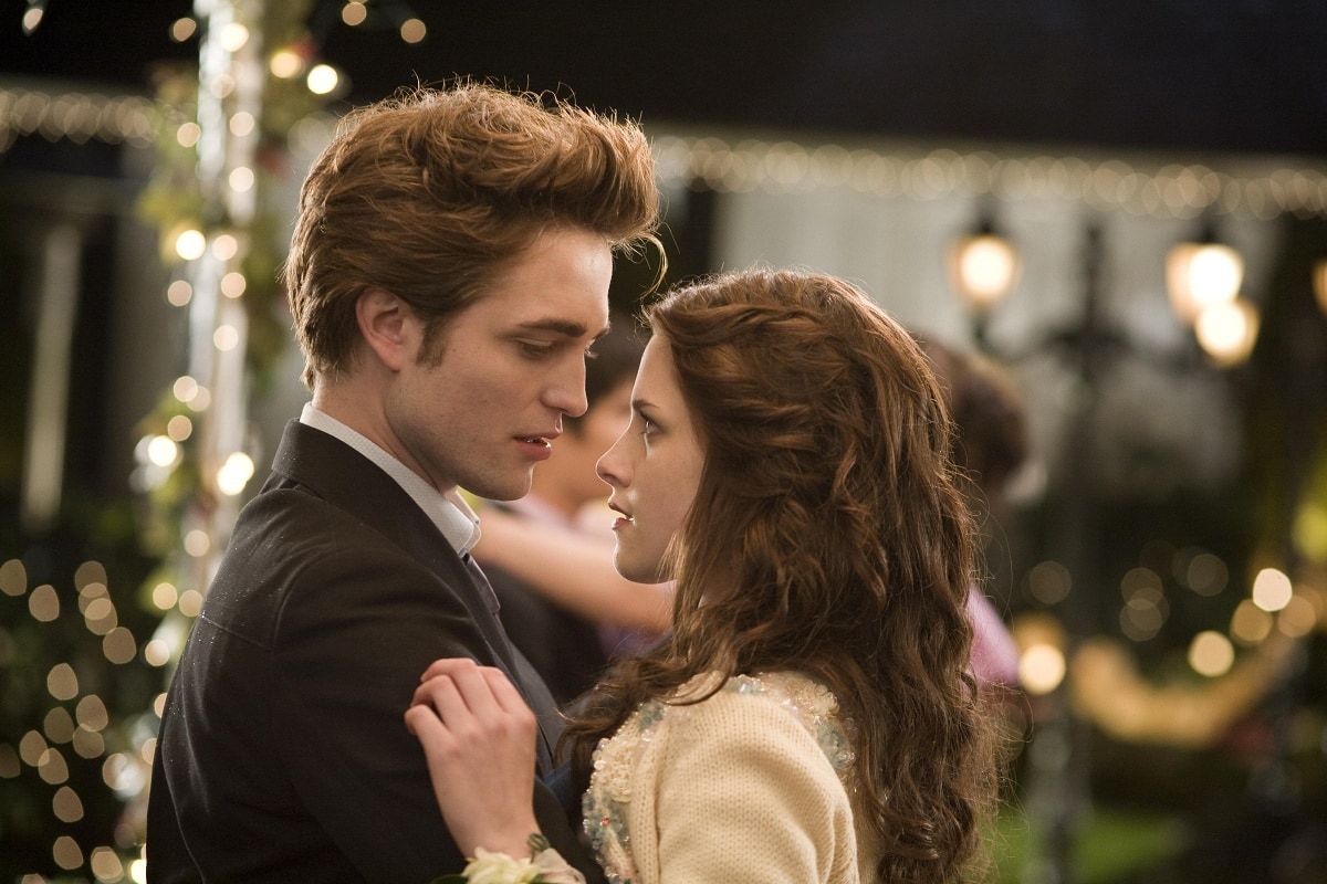 Robert Pattinson as Edward Cullen and Kristen Stewart as Bella Swan in the 2008 romantic fantasy movie Twilight