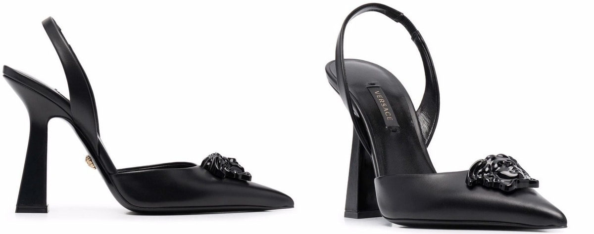 Crafted from black leather, these shoes feature pointed toes and a black Medusa plaque