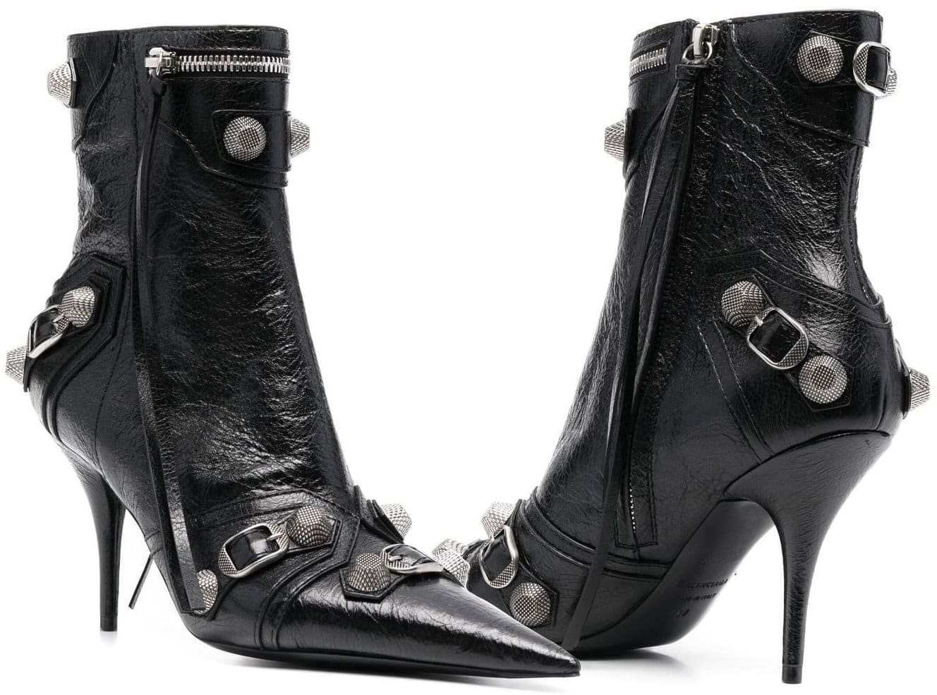 Balenciaga's Cagole boots have a crinkled finish, toughened with silver-tone stud detailing