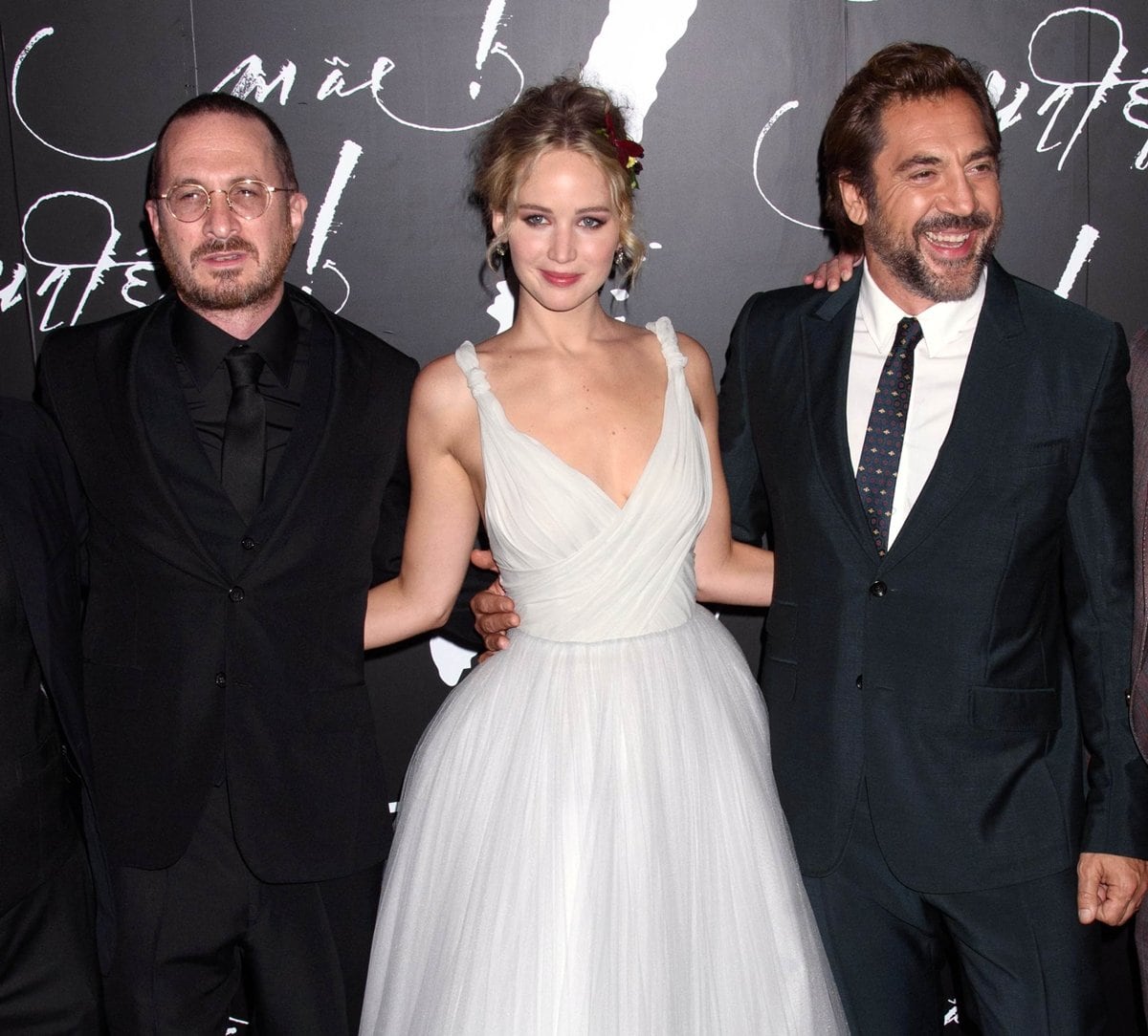 Director Darren Aronofsky, Jennifer Lawrence in a white Dior dress, and Javier Bardem attend the "mother!" New York premiere