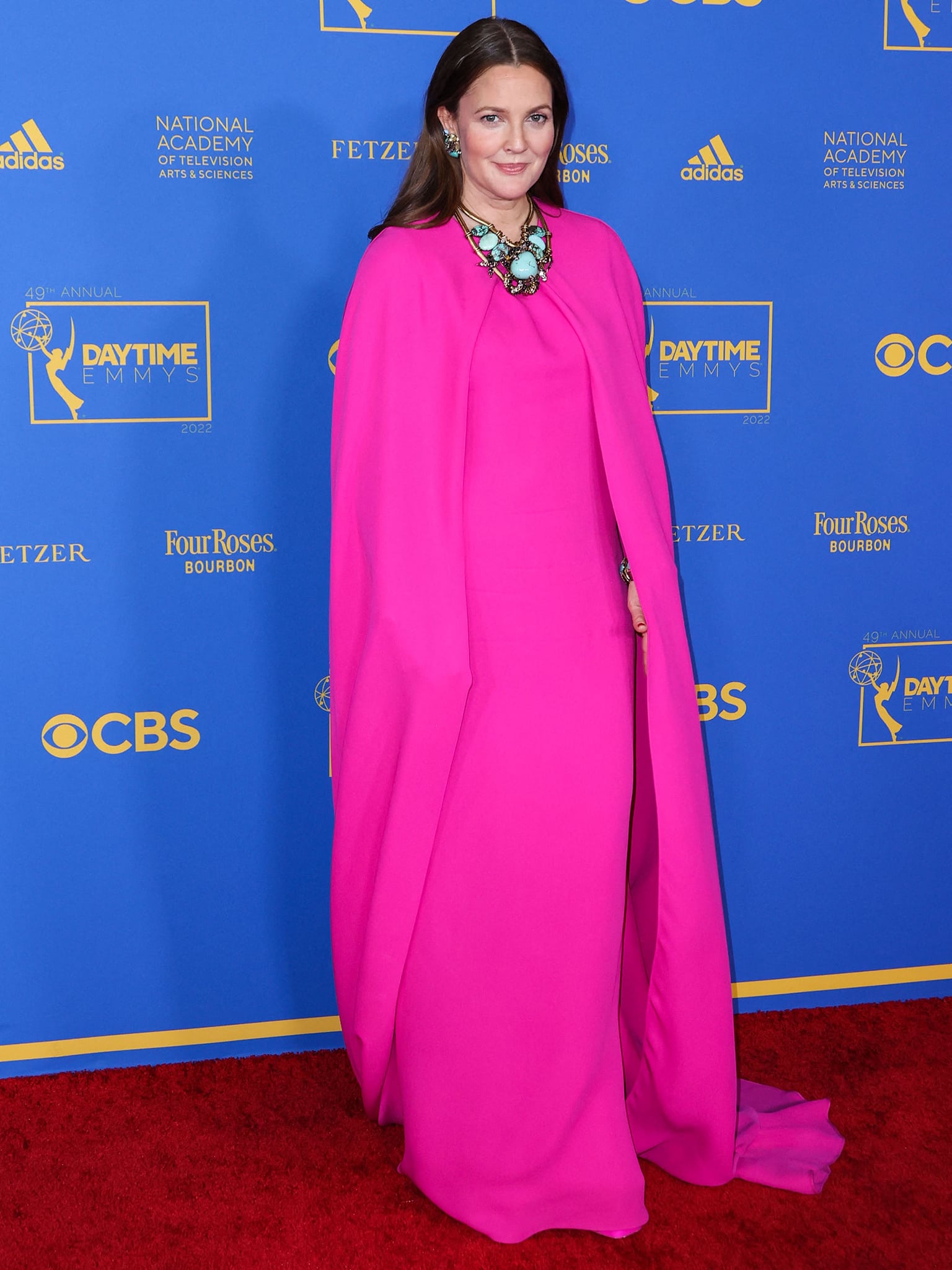 Drew Barrymore stuns in pink at the 49th Daytime Emmy Awards held at the Pasadena Civic Auditorium on June 24, 2022