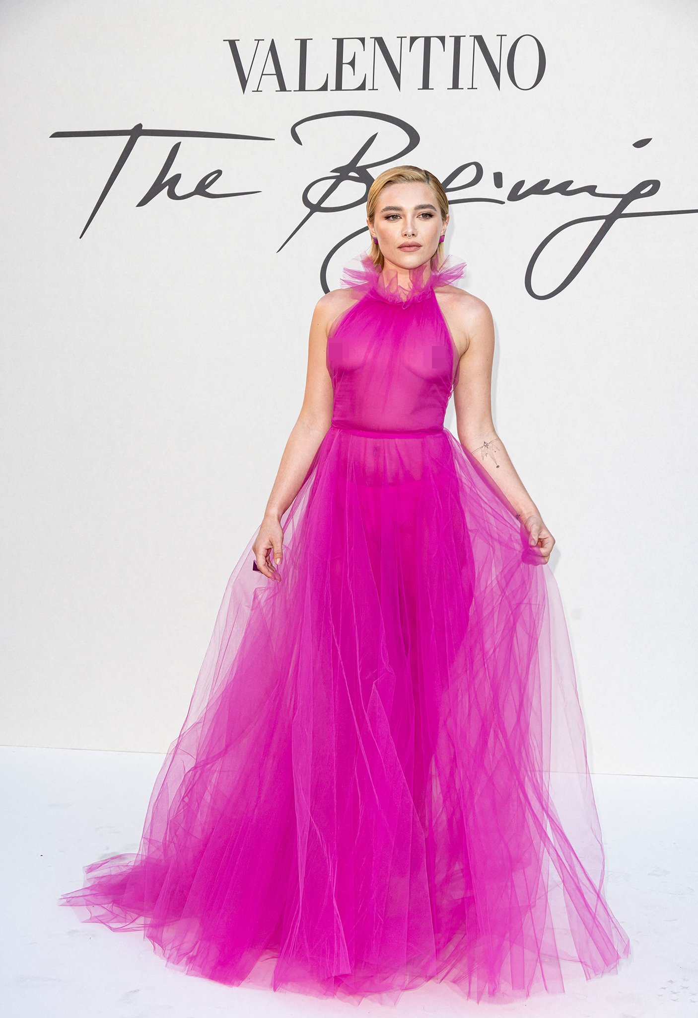 Florence Pugh frees the nipple in a pink sheer Valentino gown