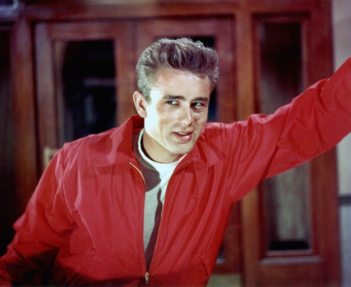 James Dean as troubled teenager Jim Stark wears a cherry-red jacket in the 1955 American coming-of-age drama film Rebel Without a Cause